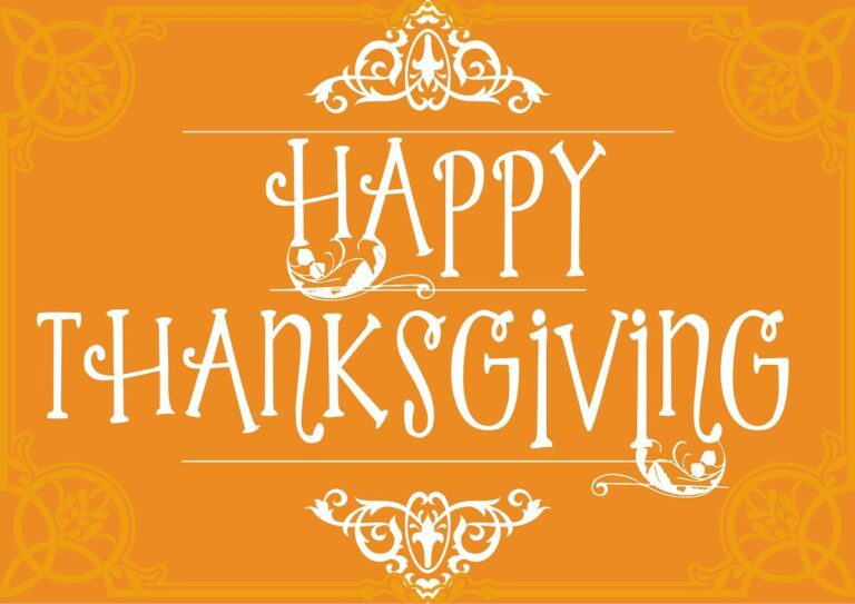 Happy Thanksgiving greeting on orange background